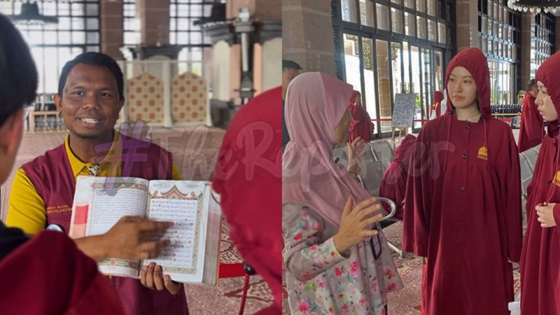 Petugas Masjid Putra menyambut pelancong dengan senyuman sambil memberi penerangan dalam pelbagai bahasa asing
