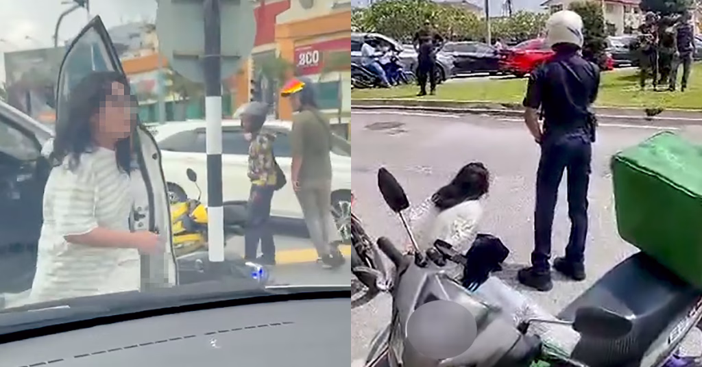 Wanita berbaju belang putih ditahan polis di Kajang.