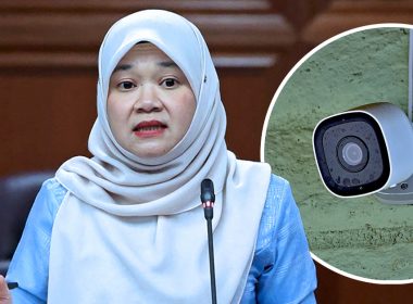 Fadhlina Sidek bercakap di Parlimen dengan imej kecil CCTV di dinding, melambangkan langkah KPM pasang CCTV di sekolah berisiko buli.