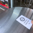 Pelekat logo halal pada meja makan di premis makanan di Pulau Pinang