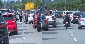 Rider muda menunggang motosikal membantu melancarkan laluan ambulans menuju Hospital Tengku Ampuan Afzan ketika kesesakan jalan raya.