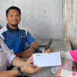 Ibu tunggal OKU bekerja sebagai penghantar makanan menggunakan basikal